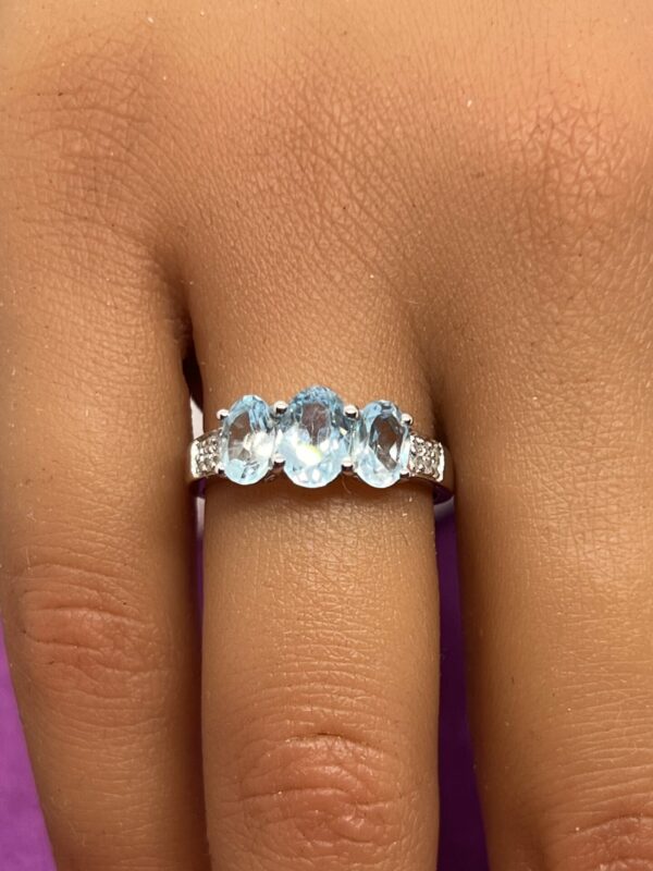 Aquamarine and diamond 9ct white gold trilogy ring