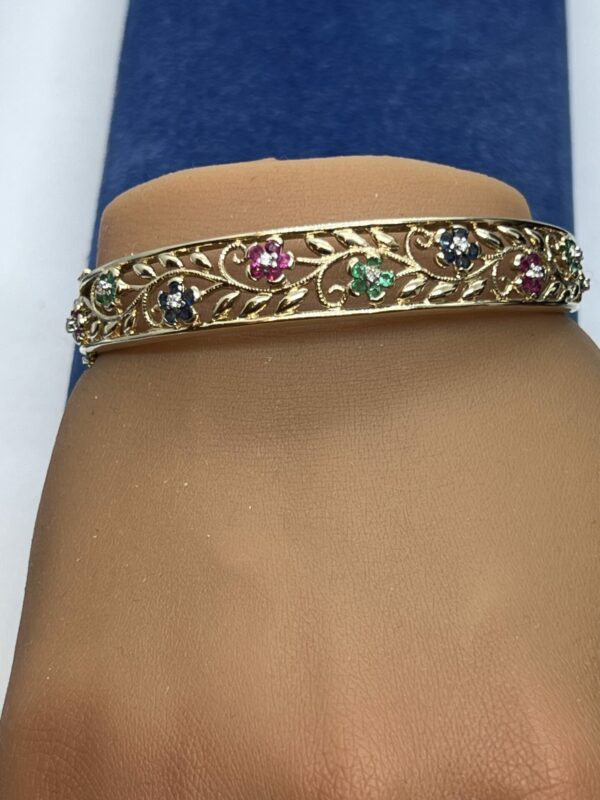 Beautiful 9ct gold gem set bangle