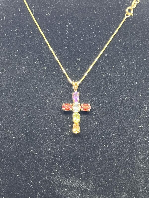 9ct gold gem set cross on a 9ct chain