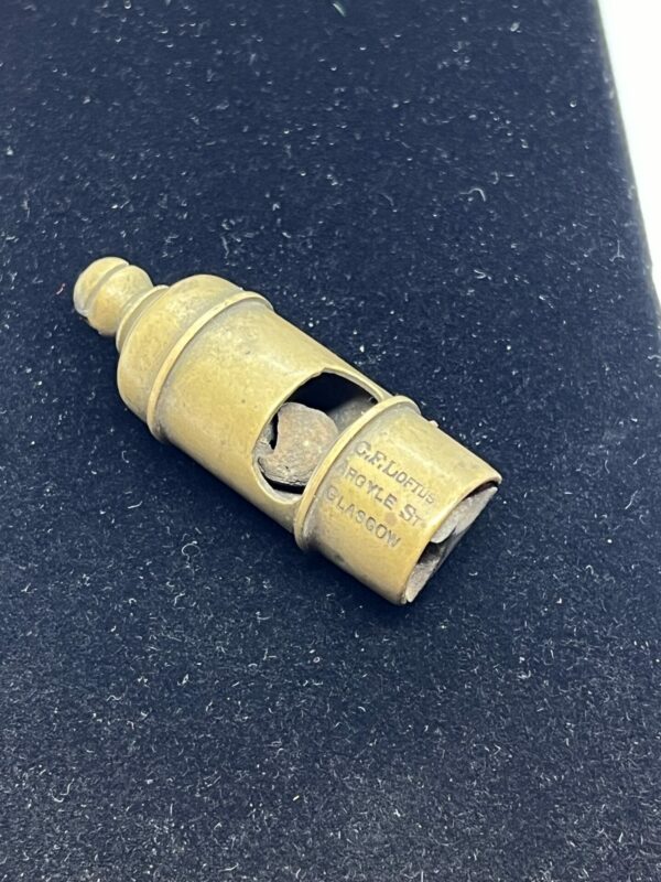 Antique pig nose brass whistle