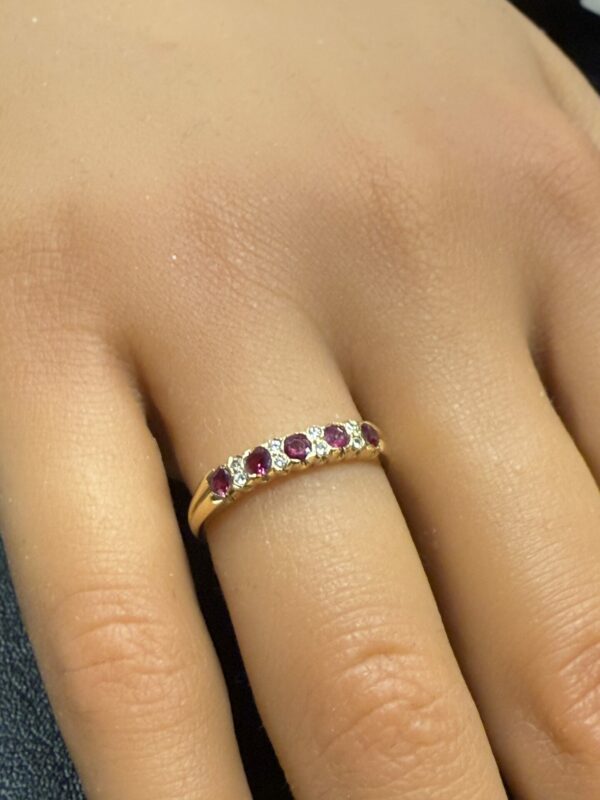 Ruby and diamond 18ct gold half eternity ring