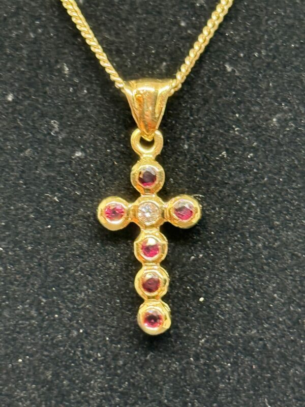 Vintage 18ct gold ruby and diamond set cross